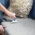GLEENER_fabricshaverlintbrush_slateblue_lifestyle_graycouch_square_blueversion_1400x_d9fed558-317c-42e8-8525-595882155972_1200x.jpg