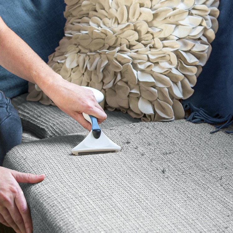 GLEENER_fabricshaverlintbrush_slateblue_lifestyle_graycouch_square_blueversion_1400x_d9fed558-317c-42e8-8525-595882155972_1200x.jpg